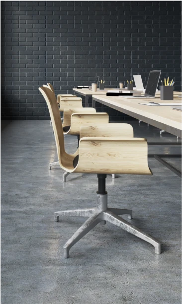 Modern conference room with sleek wooden chairs and minimalist office decor
